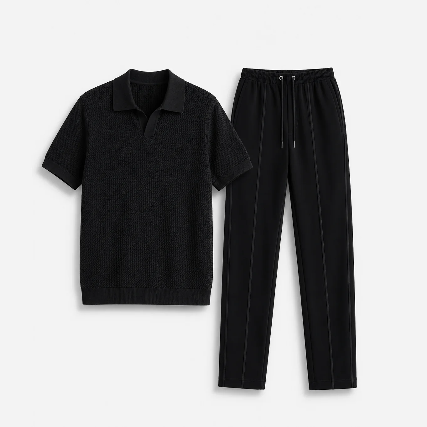 6222f1a1-df36-47f1-8a56-38277f6bd567 STWD Signature Knit Polo & Trouser Set – Black - Image 1